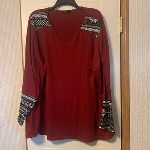 Maroon, black, and white shirt. Size unknown. Brand unknown.